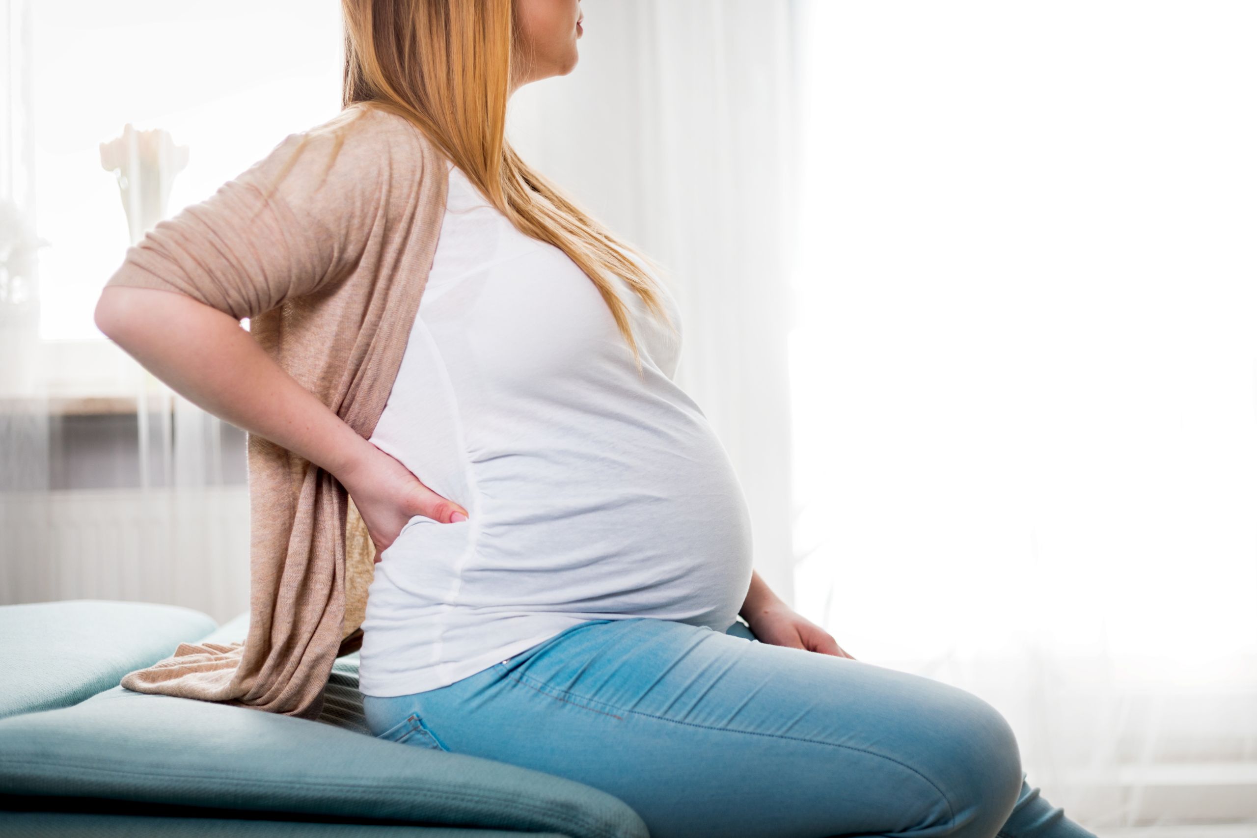 pregnant mother learning about the webster chiropractic technique